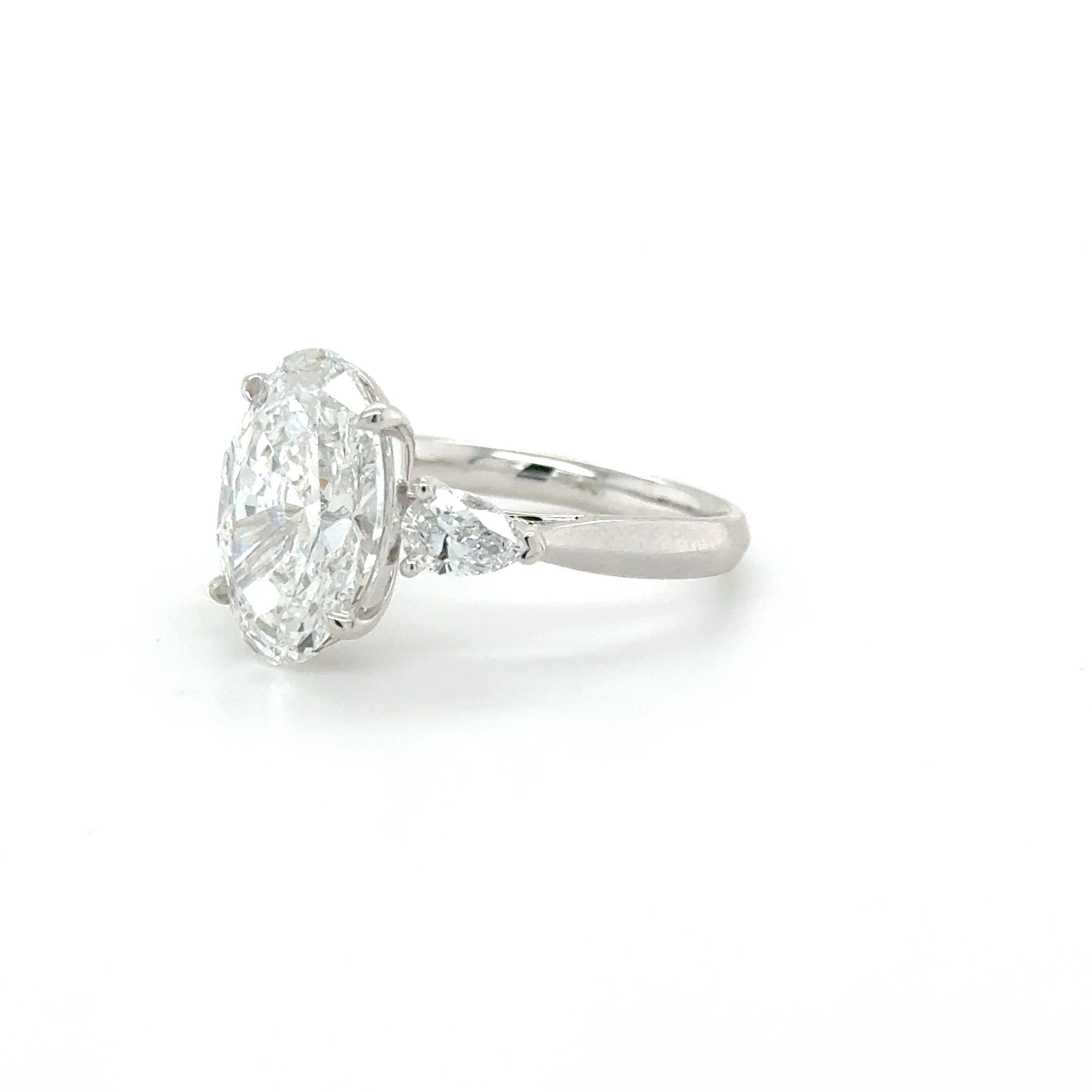 Celestine – 4.50ct Oval Engagement Ring with Pear-Shaped Side Stones | Trilogy Design