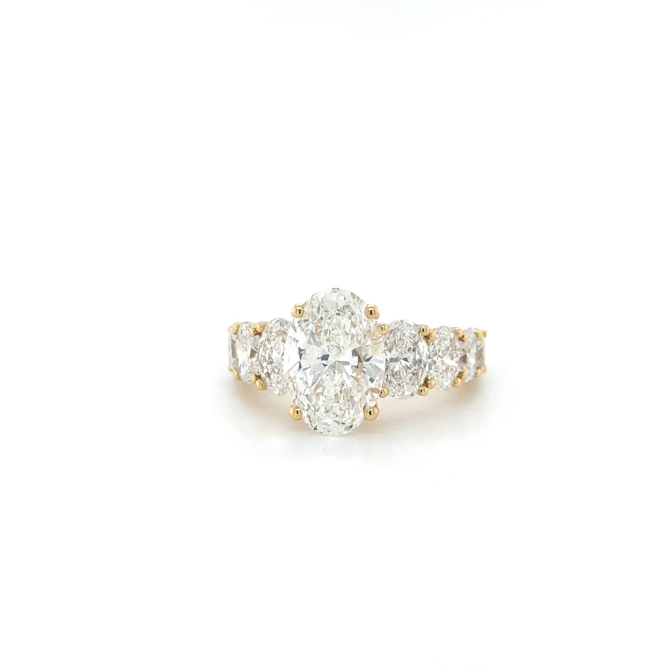 Oval Degradé Trilogy Ring – 5.95ct Diamond Brilliance