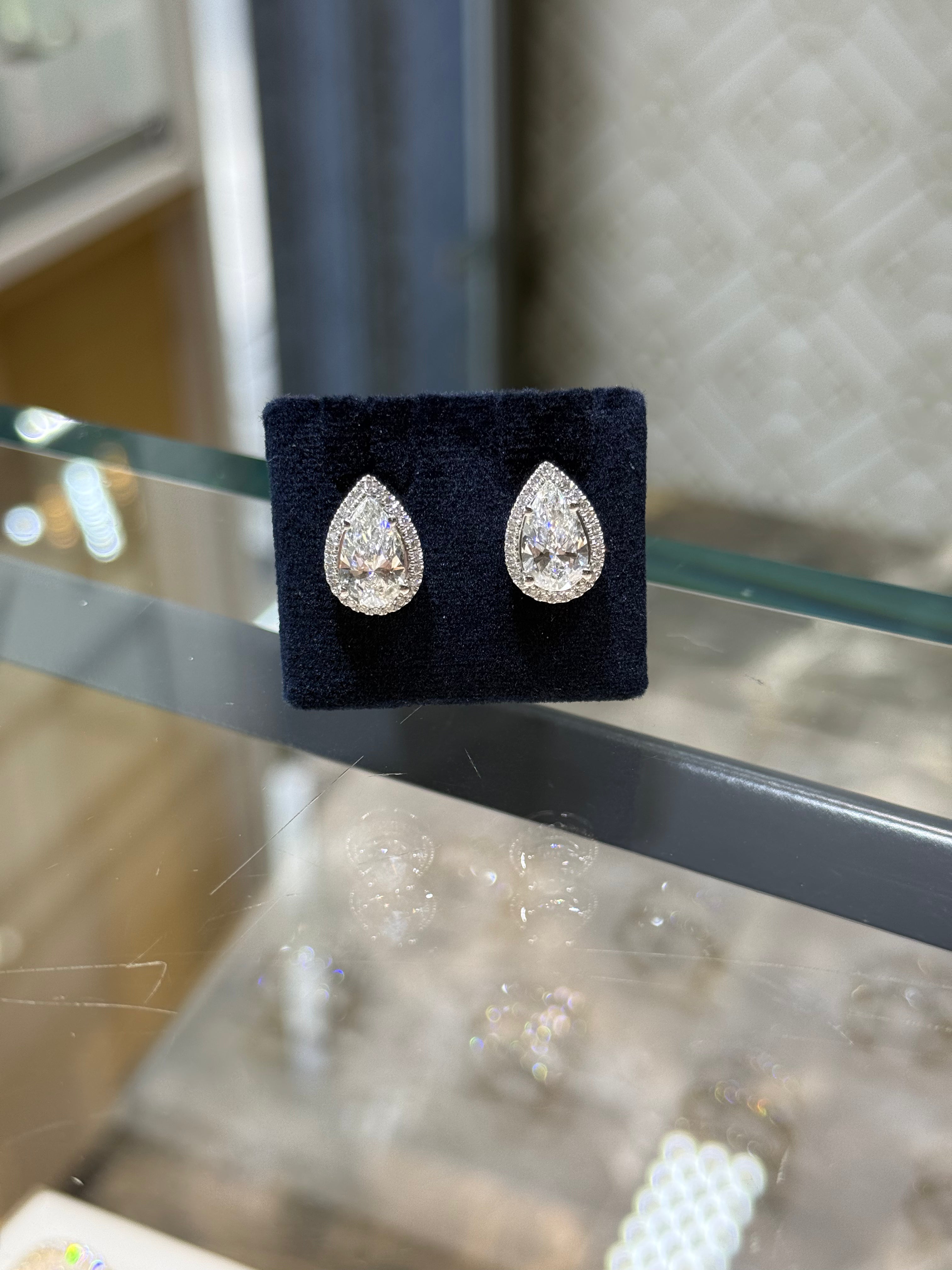Étoile Halo Pear Diamond Earrings