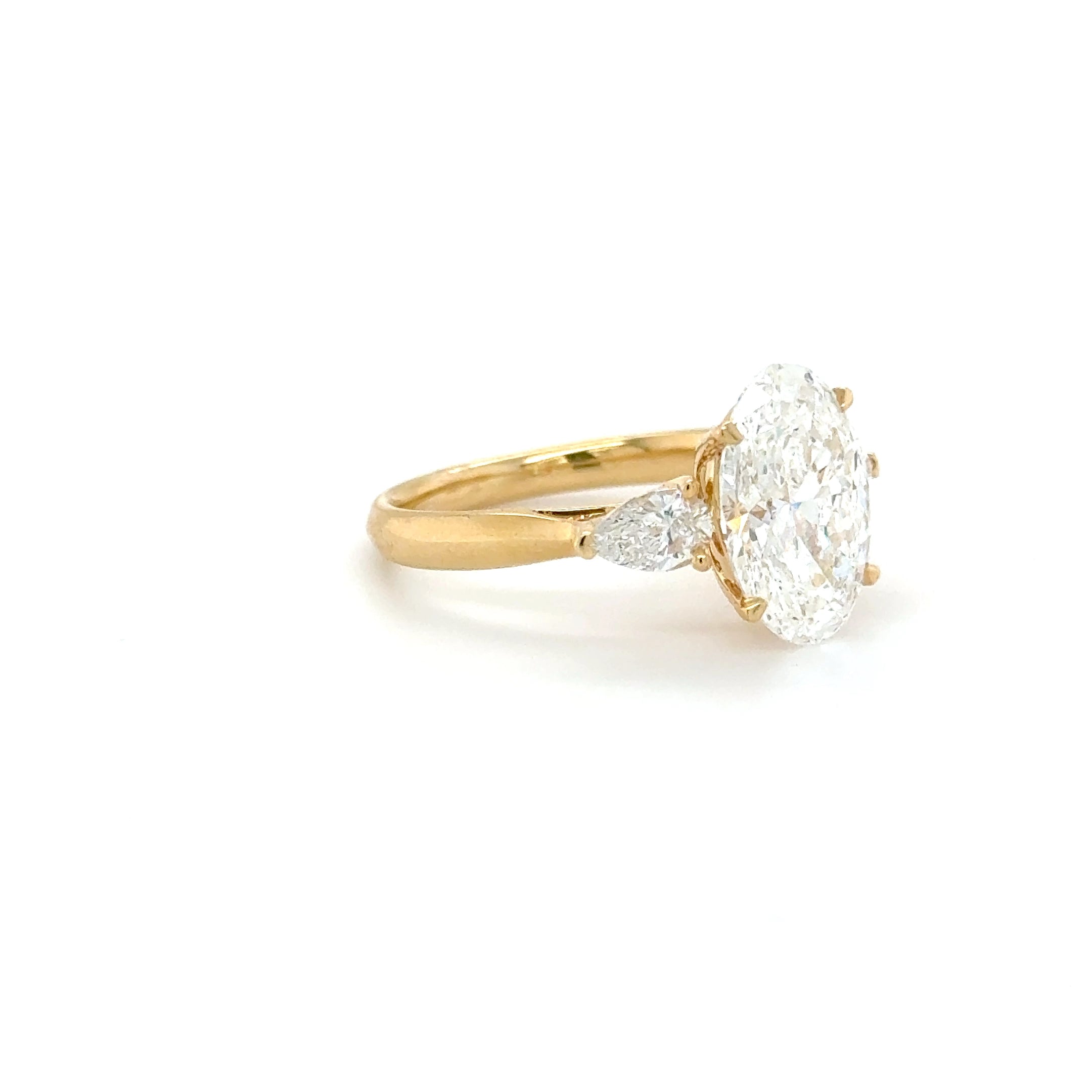 'Marielle' – 3.07ct Oval Engagement Ring with Pear-Shaped Side Stones | 18K Yellow Gold