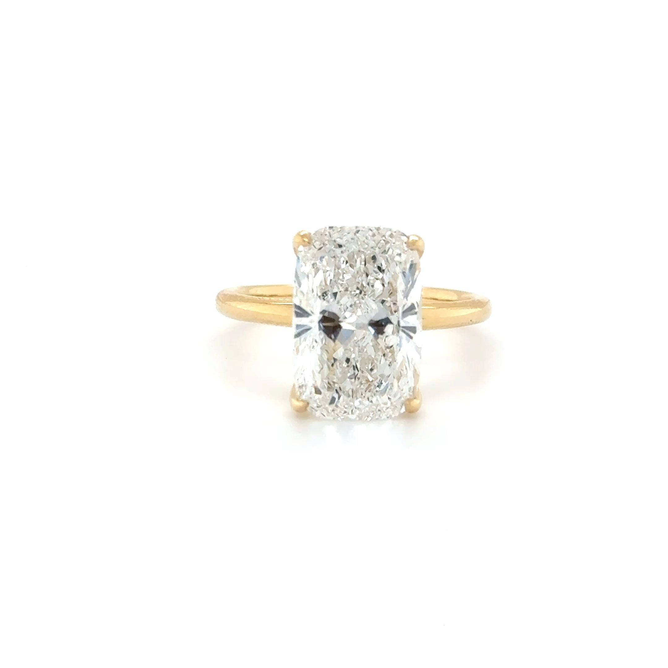 Elara – 5.03ct Elongated Cushion-Cut Engagement Ring | Four-Prong Classic Band in 18K Yellow Gold | IGI Certified