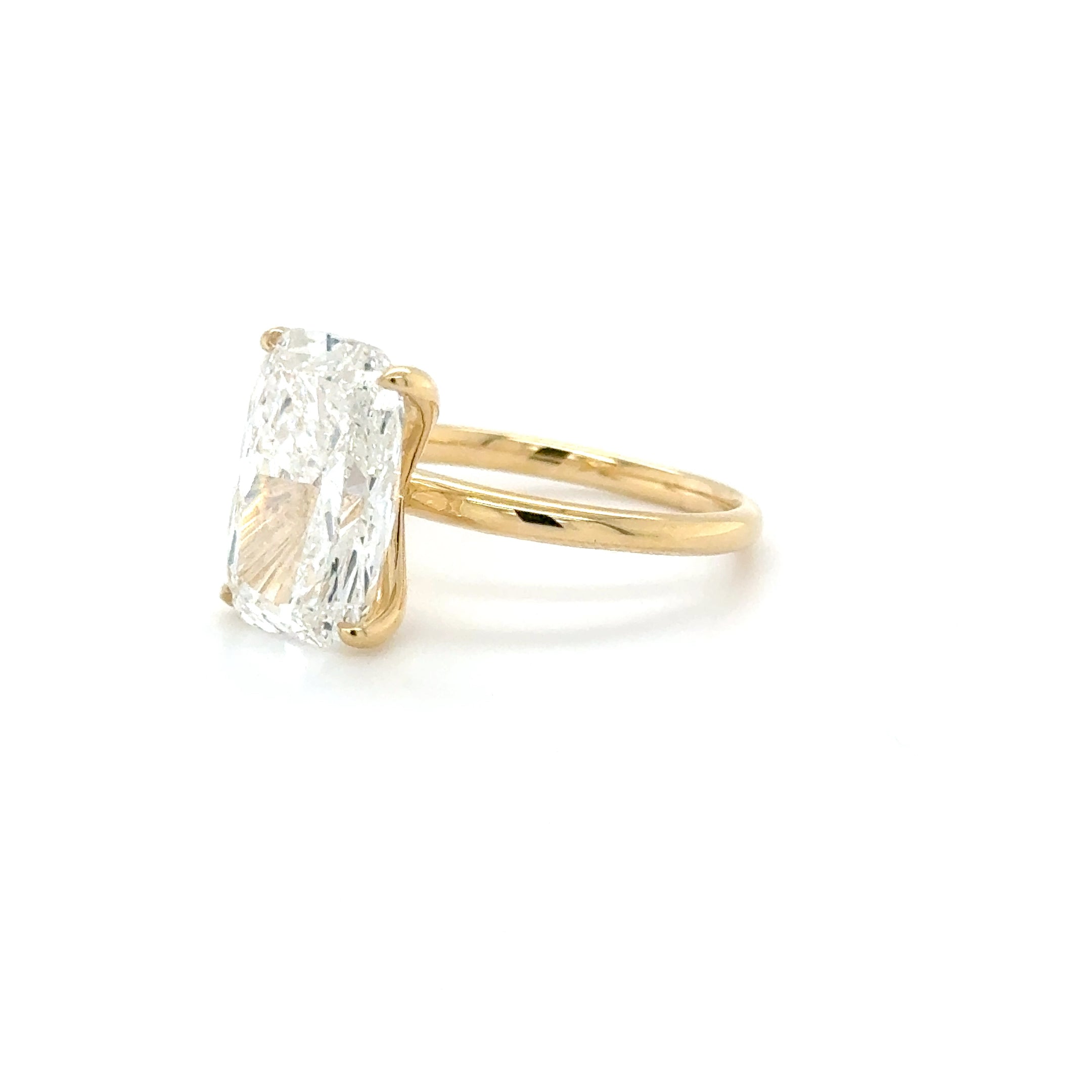 Elara – 5.03ct Elongated Cushion-Cut Engagement Ring | Four-Prong Classic Band in 18K Yellow Gold | IGI Certified