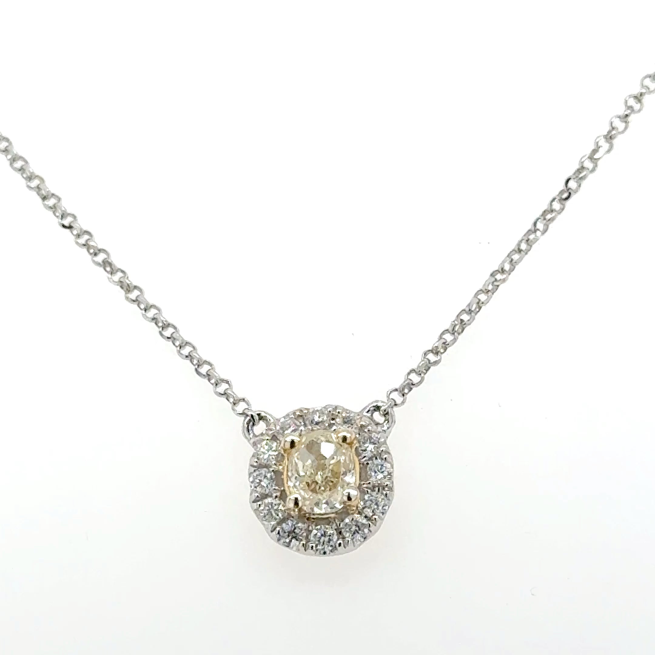 “Golden Radiance: Natural Yellow Diamond Halo Ring – 0.65ct D VVS”