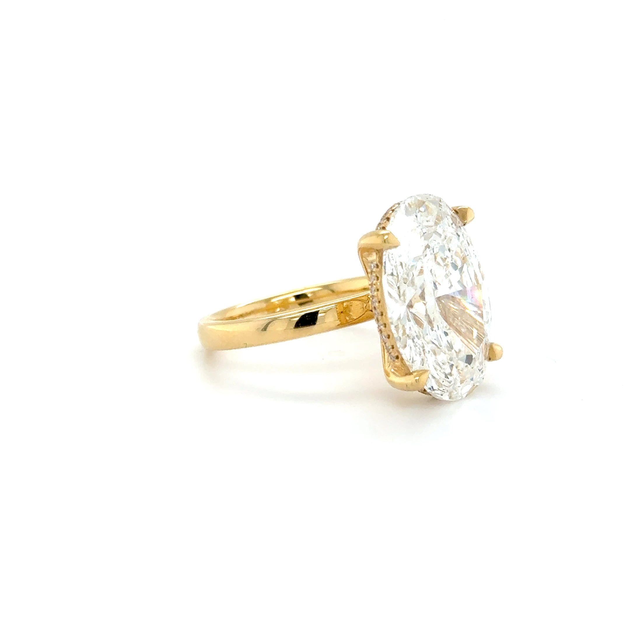 “Luminous Majesty: 10.06ct Oval Diamond Ring with Hidden Halo”