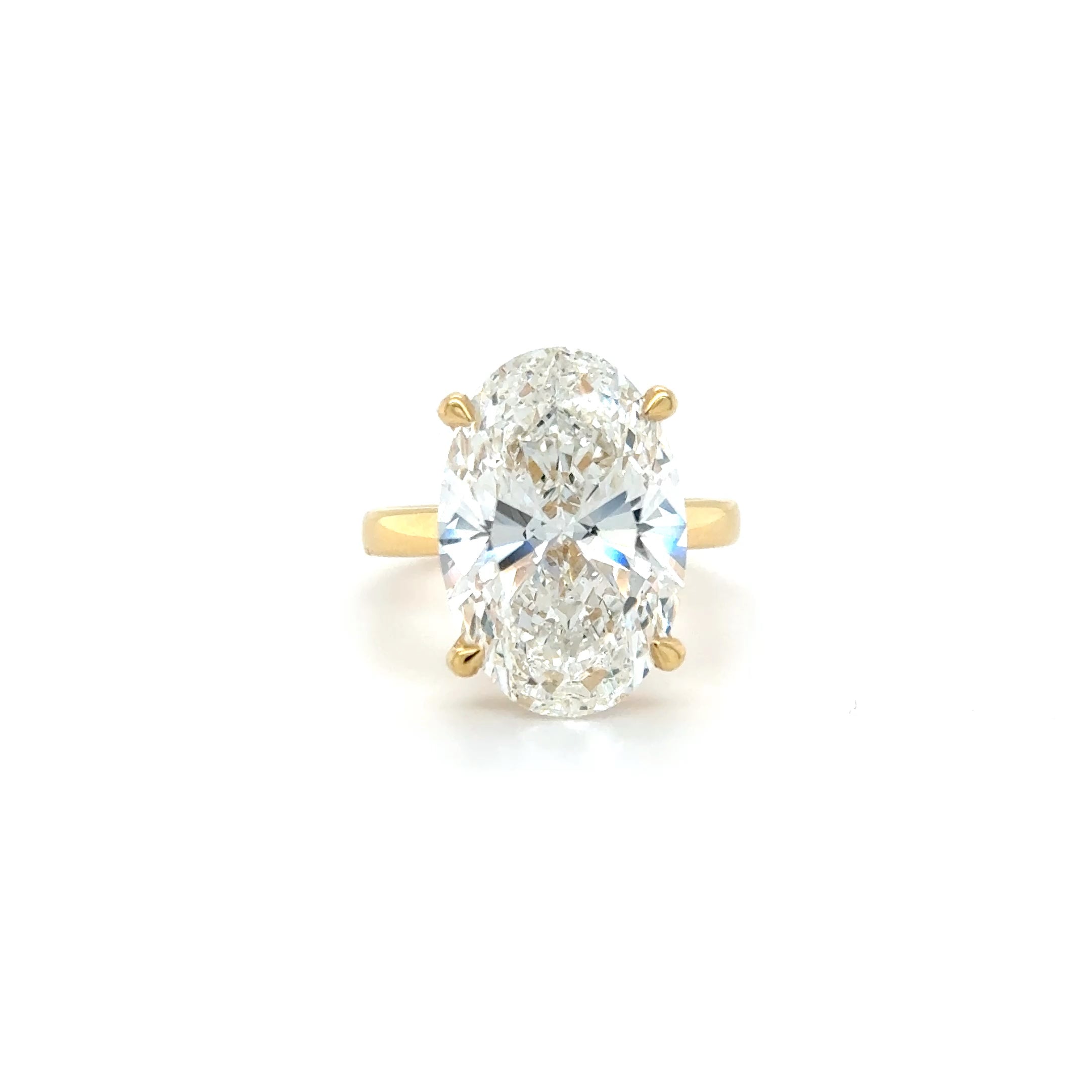 “Luminous Majesty: 10.06ct Oval Diamond Ring with Hidden Halo”