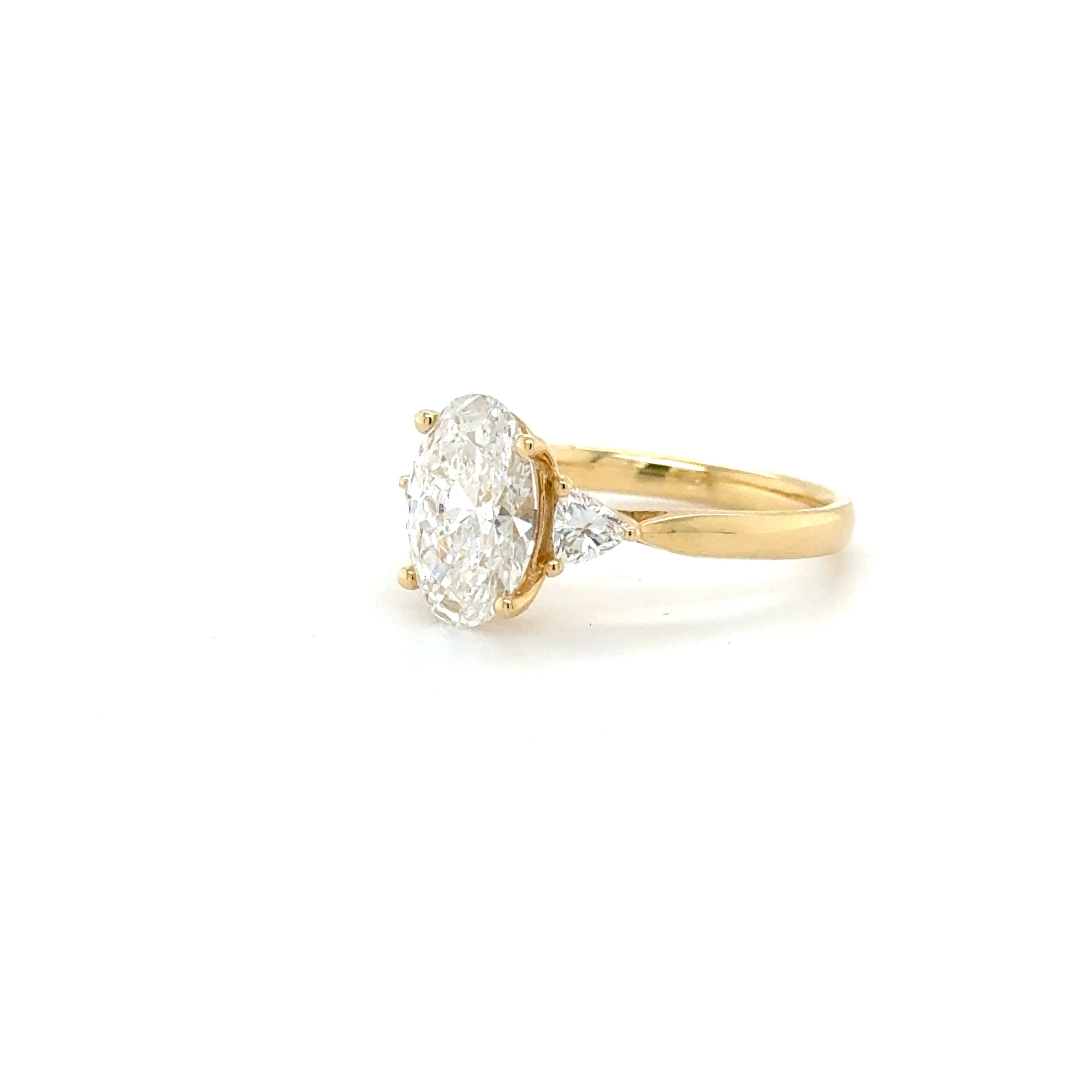 The Valora Oval Ring with Side Stones - 18k Yellow Gold Band