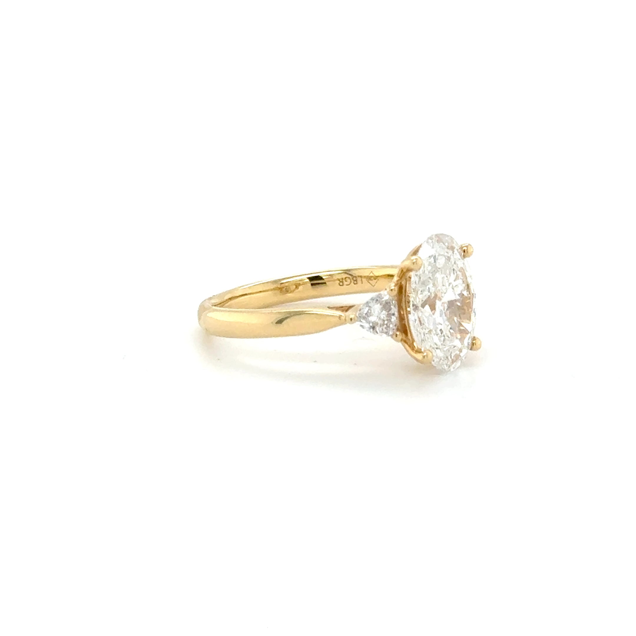 The Valora Oval Ring with Side Stones - 18k Yellow Gold Band